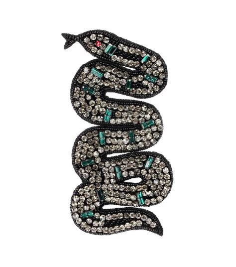 gucci snake brooch.